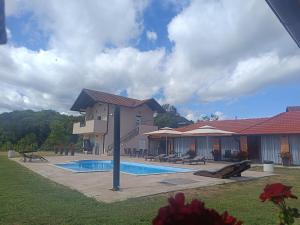 a house with a swimming pool in the yard at Vikendica Danilo in Banja Luka