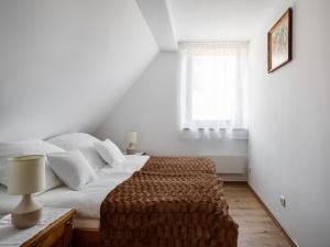 Łóżko lub łóżka w pokoju w obiekcie TatryTop Narciarski Jurgów