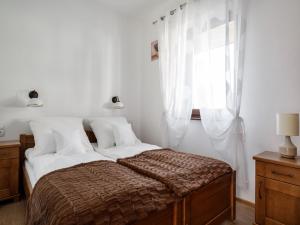 Кровать или кровати в номере TatryTop Narciarski Jurgów