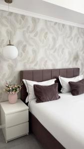 two beds sitting next to each other in a bedroom at B&B Da Jana in Pordenone
