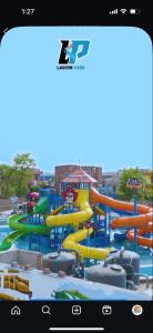 a view of a water park with a water slide at Lagoon Resort in Suitha