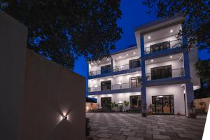 a rendering of a house at night at White Forest - PV Hotels in Pondicherry