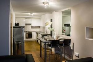 Kjøkken eller kjøkkenkrok på Fishergate Apartments