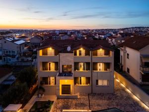 an aerial view of a building with lights at Villa Mart in Zadar