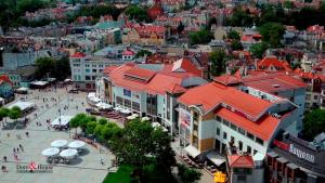 an overhead view of a city with buildings and umbrellas at Apartamenty Zacisze & by Noclegi Renters in Sopot +54 photos