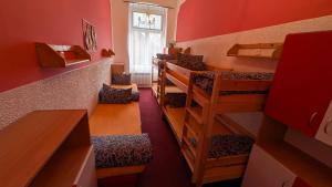 a room with three bunk beds and a window at Penzion Ruprechtice in Mezimesti +42 photos