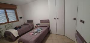 a living room with two couches and a couch at Caty House in Nettuno