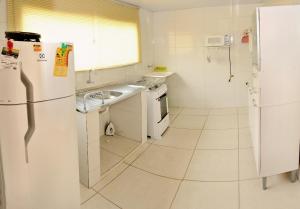 Η κουζίνα ή μικρή κουζίνα στο Apartamentos Terras Altas +13 φωτογραφίες