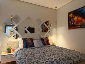 a bedroom with a large bed in a room at Mirador Capo Negro in Cabo Negro +13 photos