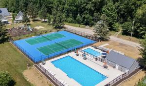 an aerial view of a tennis court with two courts at Chalet #36 The Perfect View in Stevensville