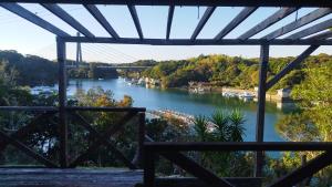 a view of a river with a bridge in the background at Cozy Koharuka in Shima +12 photos