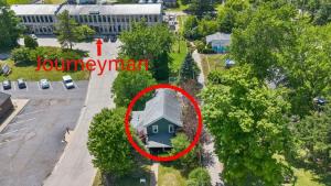an aerial view of a house with a sign that says hurricane at The Fourth Oak by Juniper Holiday + Home in Three Oaks