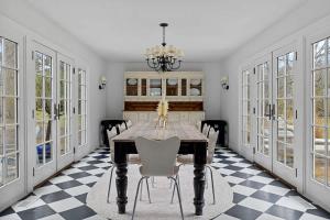 a dining room with a table and chairs at Rabbit Run by Juniper Holiday + Home in Sawyer
