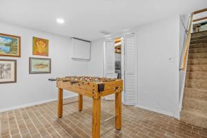 a foosball table in the middle of a room at Golden Crest Getaway in Stevensville