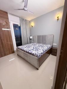 a bedroom with a bed in a room at Skypod13 in Chandīgarh