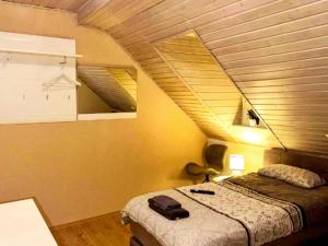 Gemütliche Wohnung in Konz an der Mosel tesisinde bir odada yatak veya yataklar