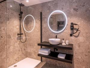 a bathroom with a sink and a shower at Villa in Belgium with Private Terrace in La-Roche-en-Ardenne +51 photos