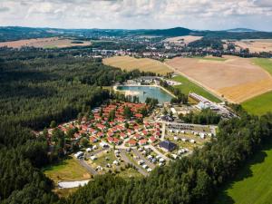 an aerial view of a park with a resort at Ferienhaus im Trixi Ferienpark in Großschönau