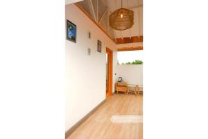 a view of the hallway of a house at Matappa Guest House in Pulau Sarang