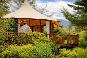 a gazebo in the middle of a garden at Hemma Genki Luxury Wellness Hotel Villa in Villa de Leyva