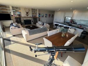 a view of a living room with a bike at Mark II 3W in Mount Buller