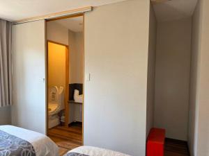Llit o llits en una habitació de Lakes森-2