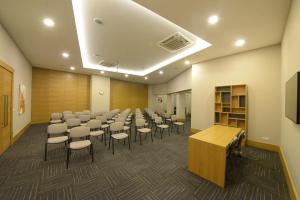 a conference room with a bunch of chairs and a podium at Hotel Yayoba in Tekirdag +31 photos