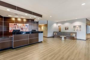a lobby of a hospital with a waiting room at Cambria Hotel Denver International Airport in Aurora +39 photos