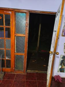 an open door to a room with an open door at Hare maohi in Hanga Roa