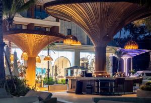 a lobby with domed ceilings in a building at Sunshine Beach Layan by Beringela in Layan Beach