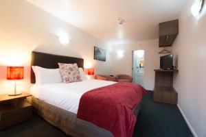 Postel nebo postele na pokoji v ubytování The Park Hotel Ruapehu