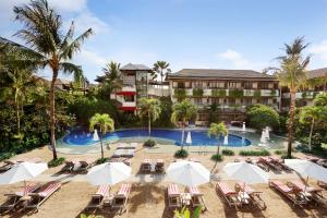 an aerial view of a resort with chairs and a pool at Blu-Zea Resort by Double-Six in Seminyak