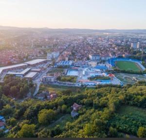 an aerial view of a city with a park at Orca Apartman in Jagodina