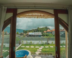 a view from the window of a house at Star Hill Kintamani in Kubupenlokan
