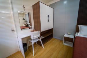 Postel nebo postele na pokoji v ubytování Balay Talisay + 18 fotografií