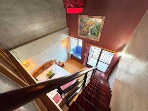 an overhead view of a staircase in a house at Wanzai B&B in Xiaoliuqiu