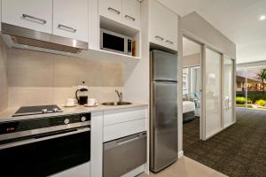 A kitchen or kitchenette at Quest Brighton on the Bay