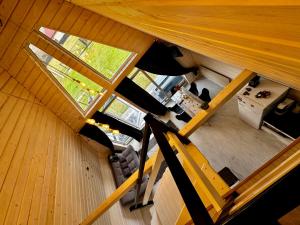 an overhead view of a living room with two windows at Шале WeLKoMe in Verkhovyna