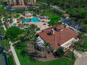 an aerial view of a resort with a swimming pool at Coastal Serenity Spacious 3Br Condo In Minorca in New Smyrna Beach