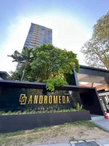 a sign in front of a building at Andromeda Condominium Pattaya in Pattaya South