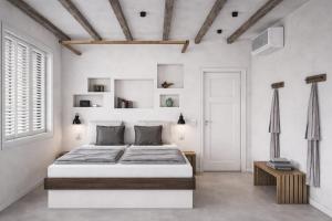 a white bedroom with a large bed and a window at Eco Resort WildLand - Zanzibar in Bwejuu
