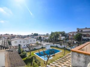a view of a city with a swimming pool at Enric Borras in Roda de Bará