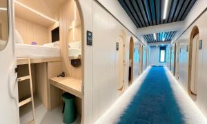 a corridor of a hospital with a long hallway at Wostel The Comfort Hostel in Málaga