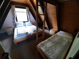 an overhead view of a bedroom with bunk beds at Ferienhaus Winnetou 114 in Waldbrunn
