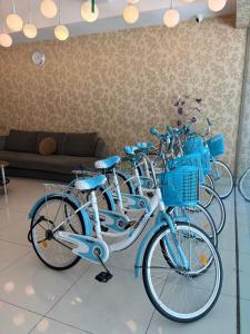 a group of bikes parked in a room at Mercury Boutique Hotel in Malacca