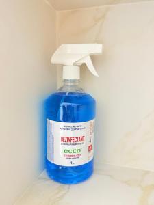 a blue bottle of detergent sitting on a counter at Hostel Chisinau Centru in Chişinău