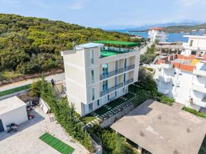 an aerial view of a white building at Golden Hill Ksamil in Ksamil