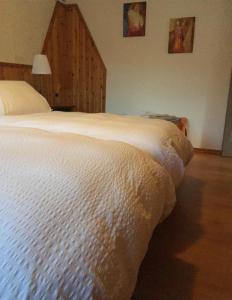 Postel nebo postele na pokoji v ubytování Maison Perron CIR- VDA-LATHUILE-N0062