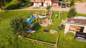 an aerial view of a backyard with a playground at Urbanshof Herr Tobias Fehrenbach in Hinterzarten