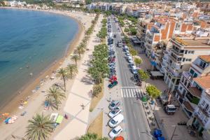 an aerial view of a beach and buildings at Casa Deti in Roses